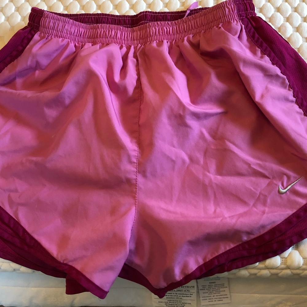 Nike running shorts pink, size small and in EUC.